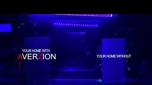 screenshot from a video of glowing scorpions crawling around in a dark room illuminated by a black light